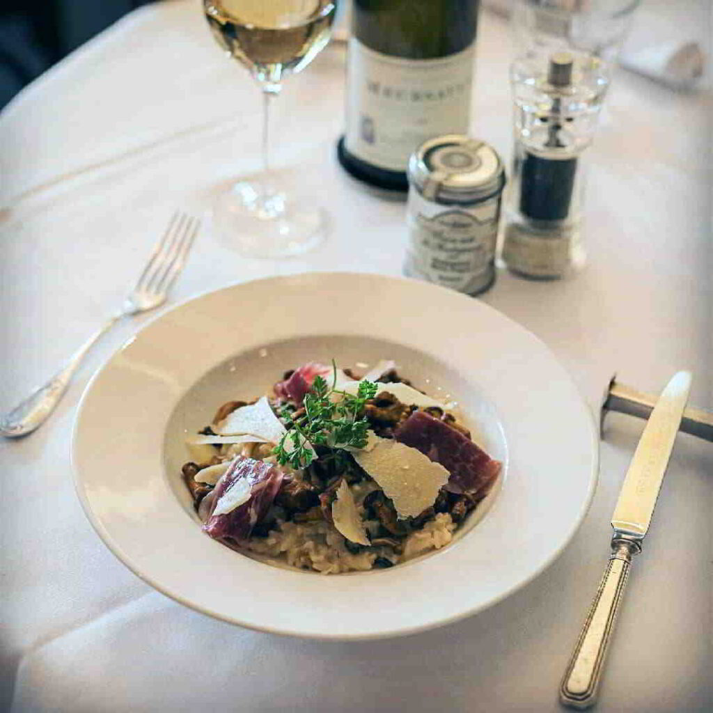 Bottle of Meursault Piment accompanying a meal